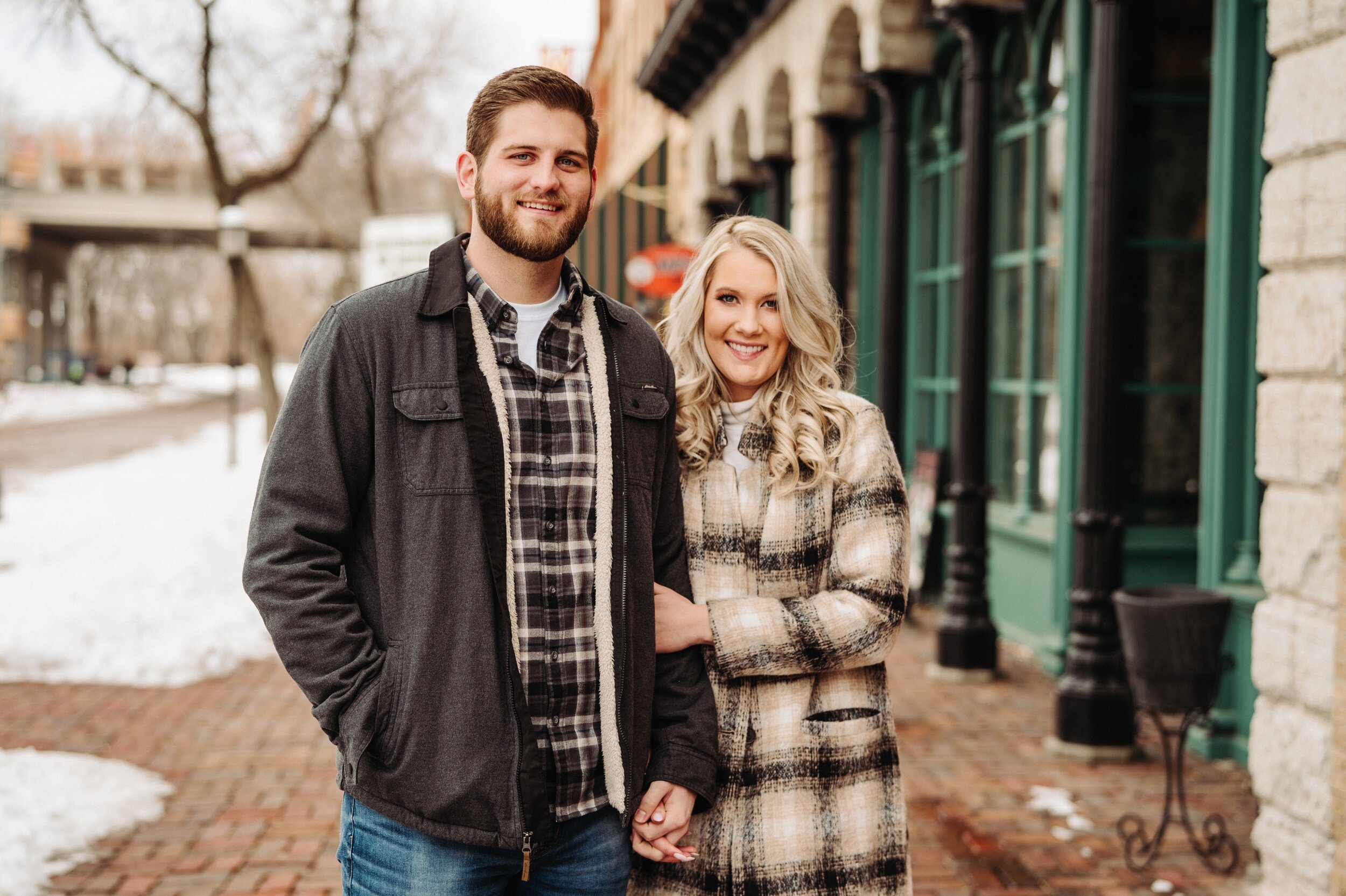 01_minneapolis-engagement-photos-st-anthony-main-1_Winter Minneapolis engagement session at st Anthony main. .jpg