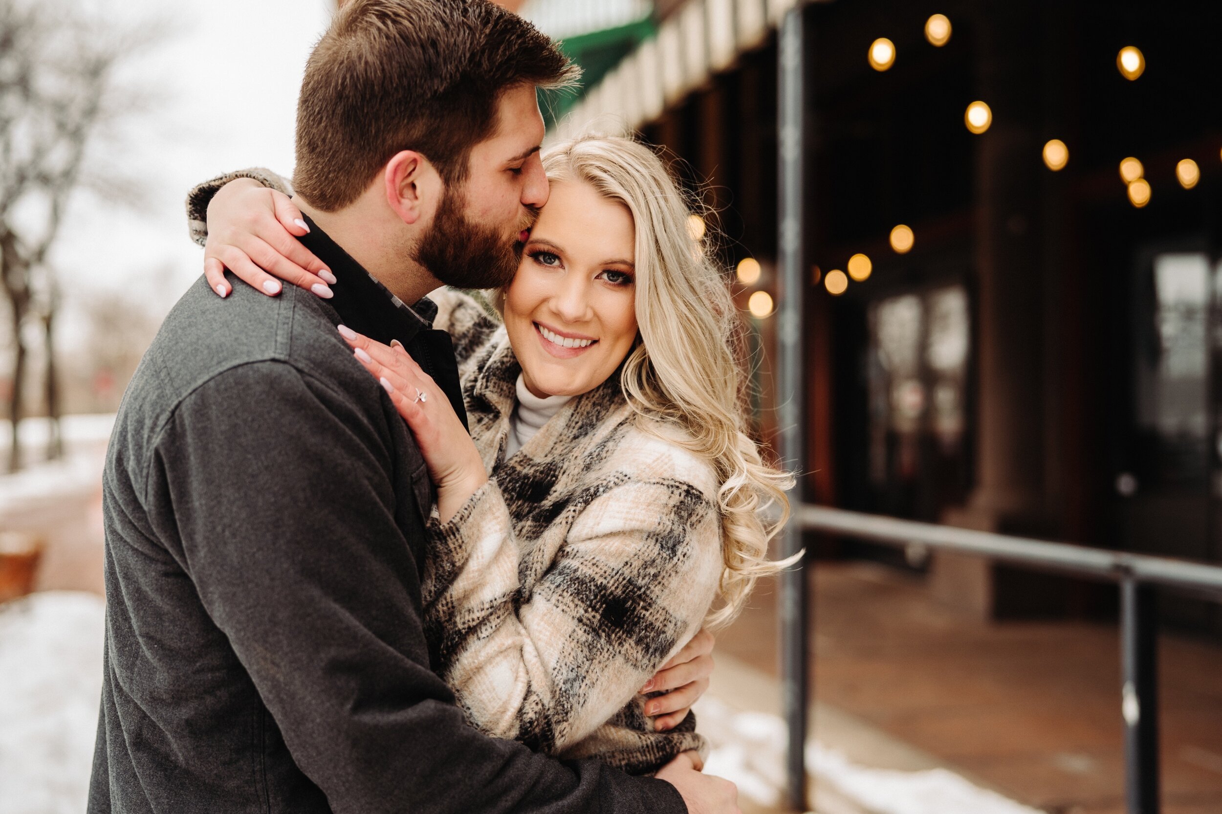 04_minneapolis-engagement-photos-st-anthony-main-20_Winter Minneapolis engagement session at st Anthony main. .jpg