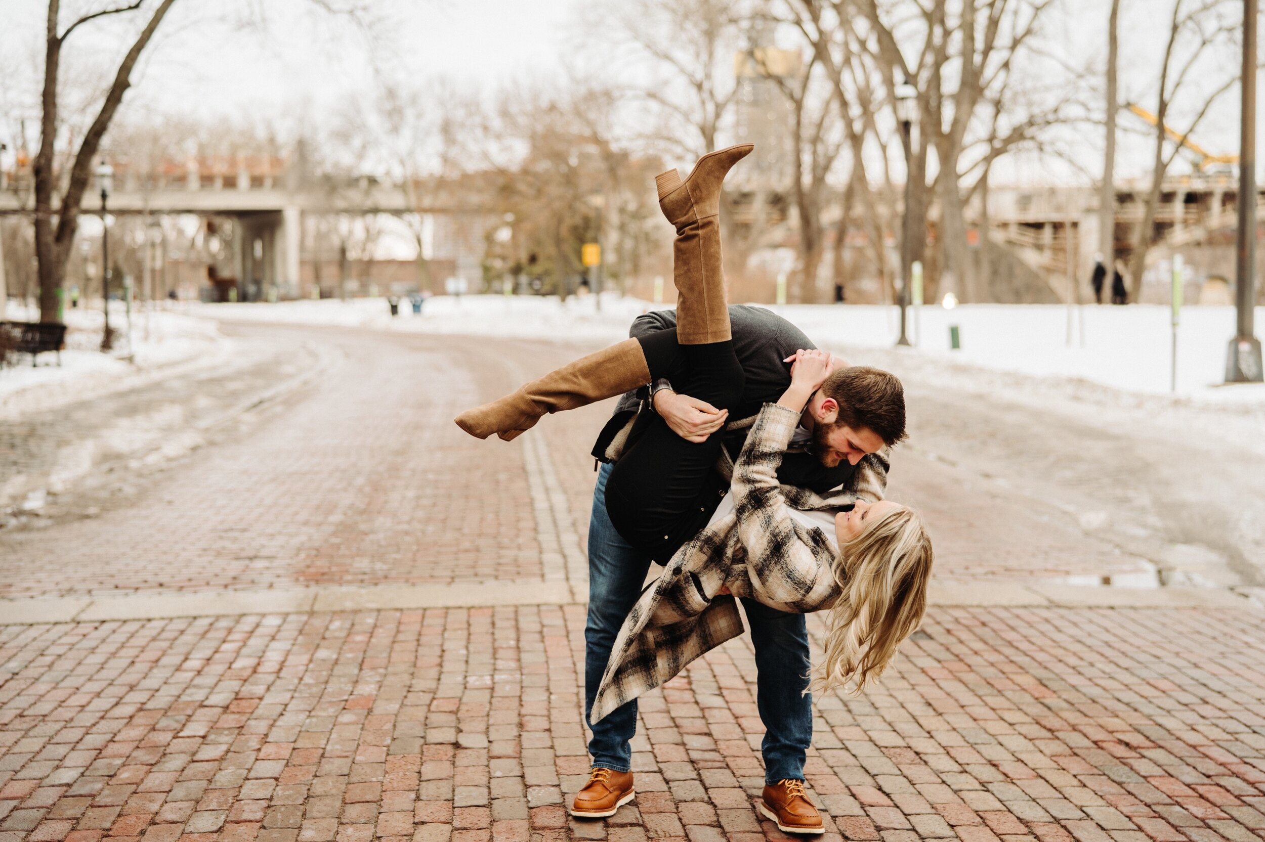 07_minneapolis-engagement-photos-st-anthony-main-28_Winter Minneapolis engagement session at st Anthony main. .jpg
