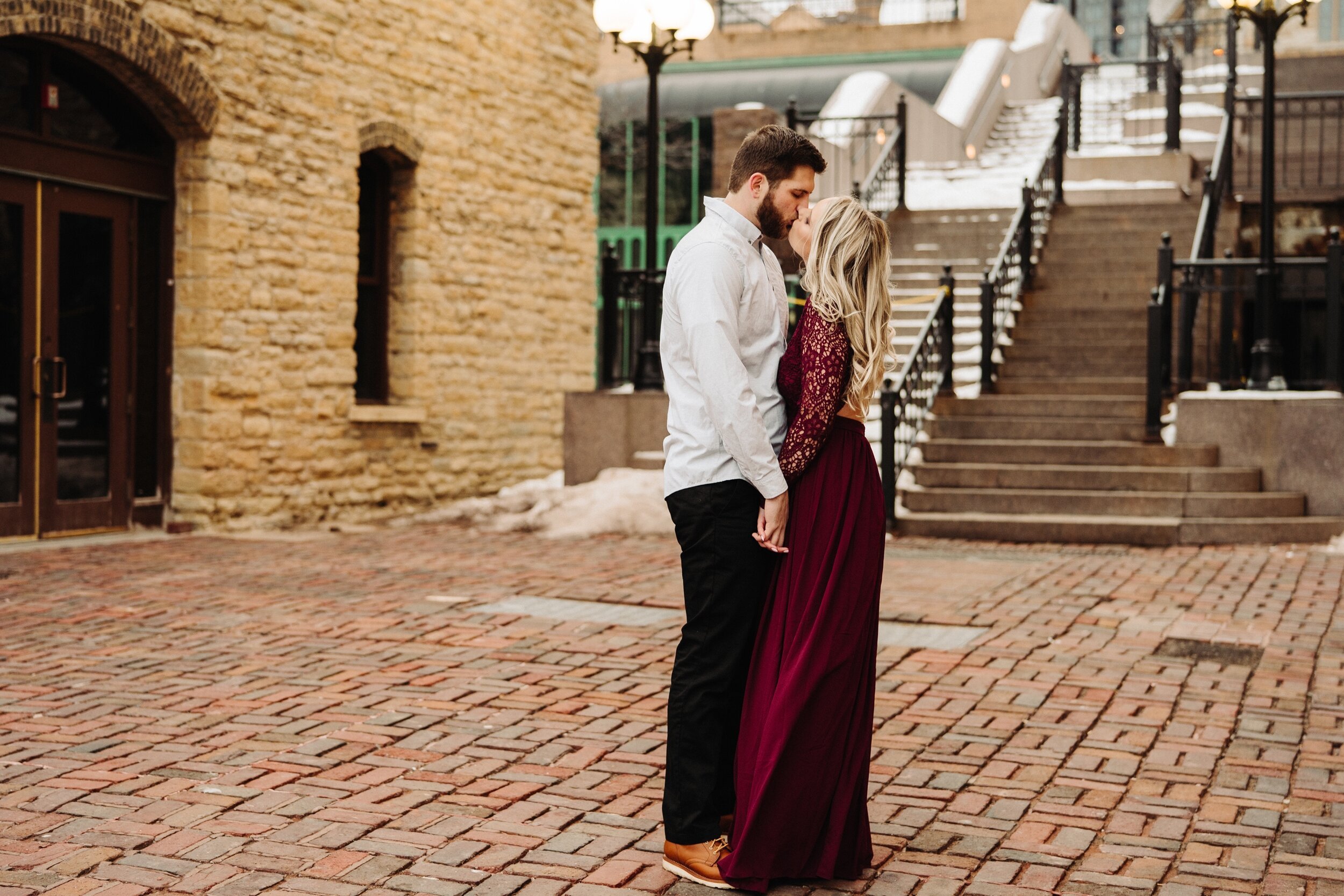 12_minneapolis-engagement-photos-st-anthony-main-38_Winter Minneapolis engagement session at st Anthony main. .jpg