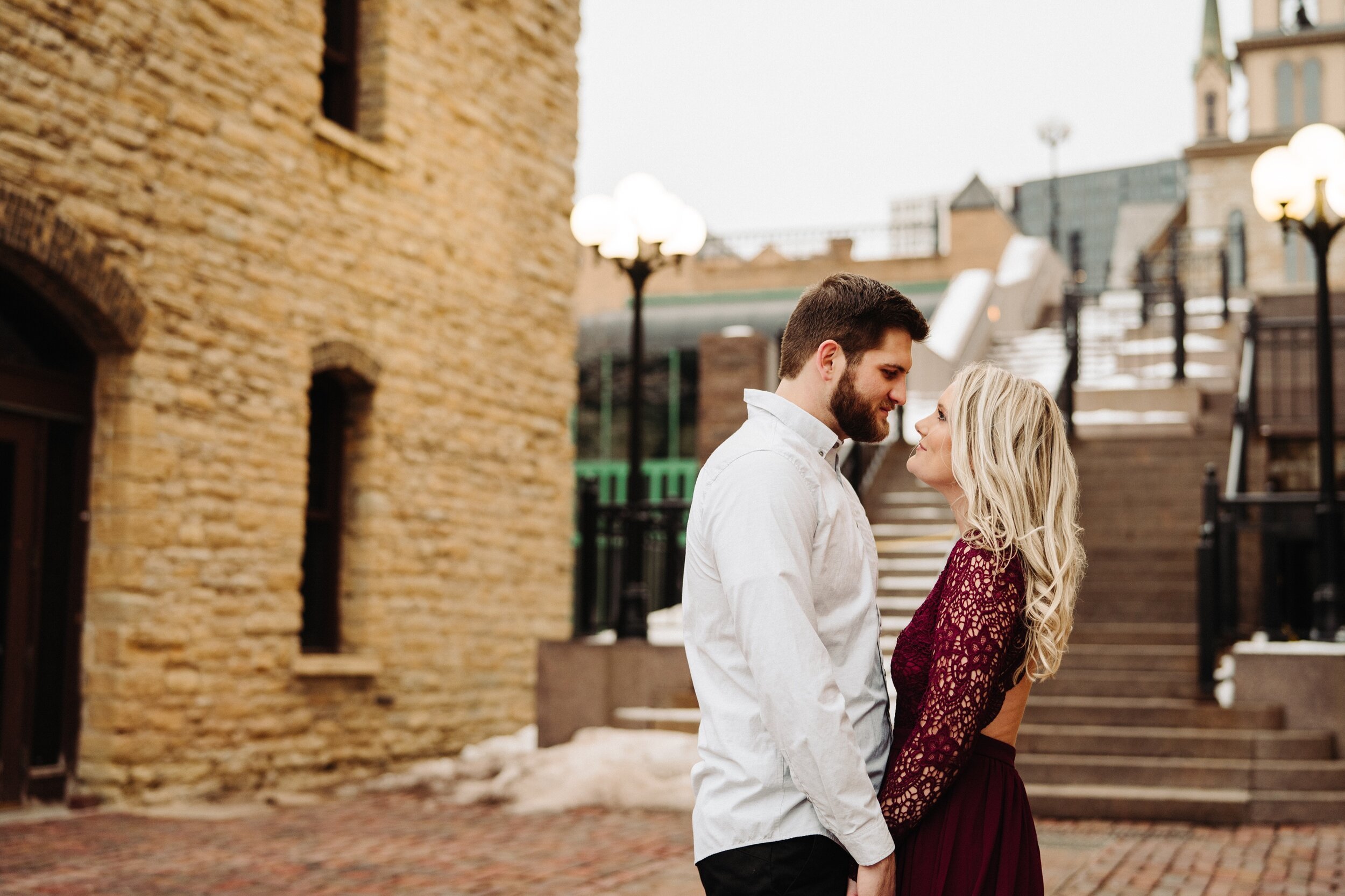 14_minneapolis-engagement-photos-st-anthony-main-37_Winter Minneapolis engagement session at st Anthony main. .jpg