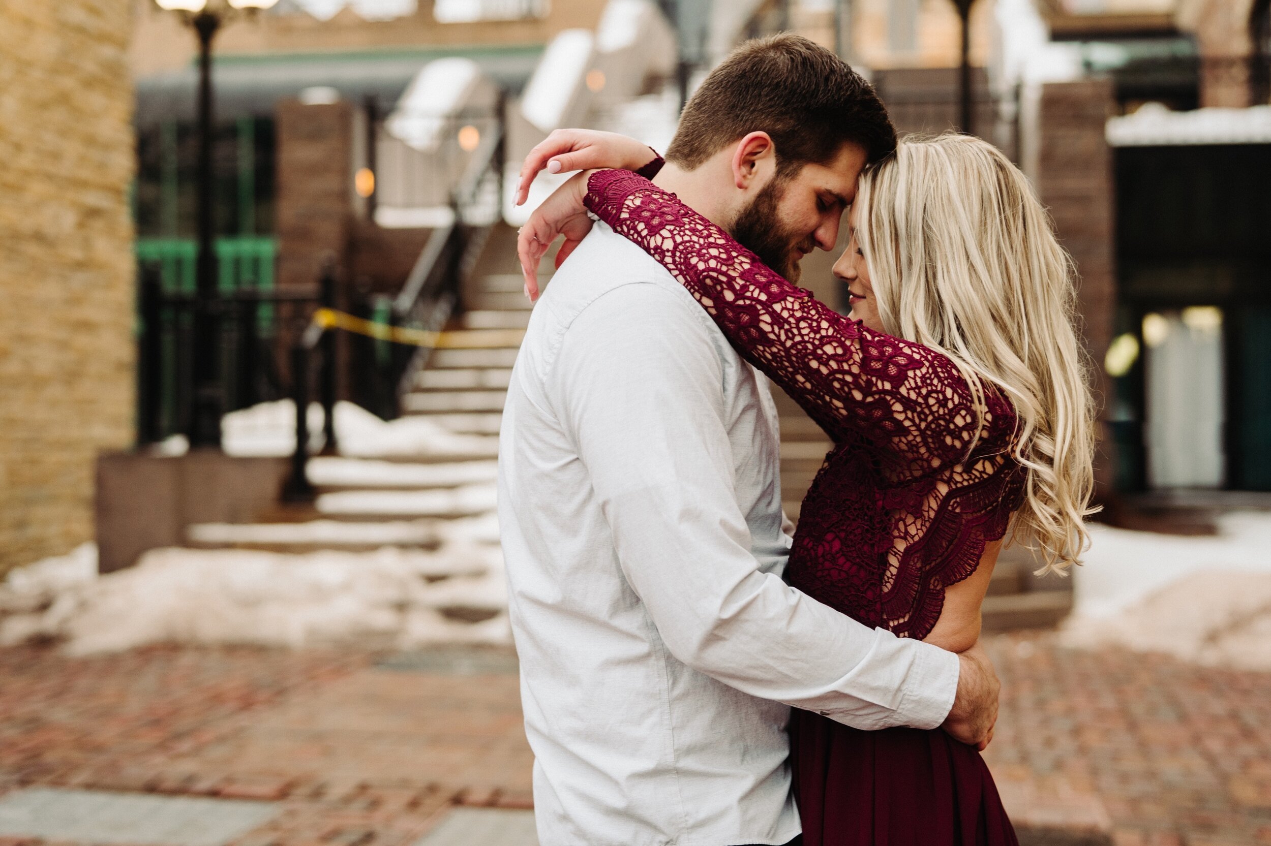 16_minneapolis-engagement-photos-st-anthony-main-44_Winter Minneapolis engagement session at st Anthony main. .jpg