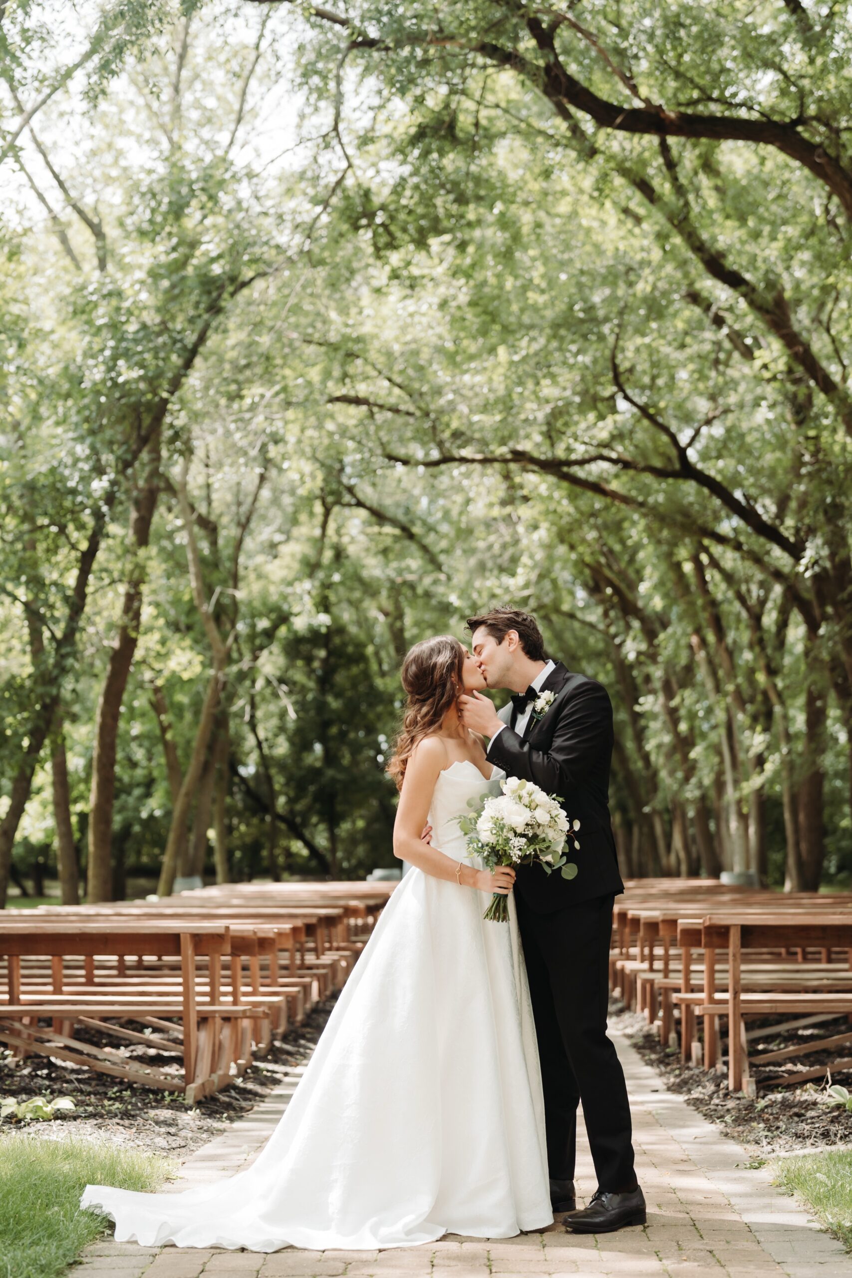 Bride and groom kissing at Carlos Creek Winery